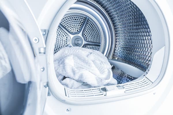 Dryer repair services - Sam's Appliance Repair Inside of tumble dryer with clean white towels